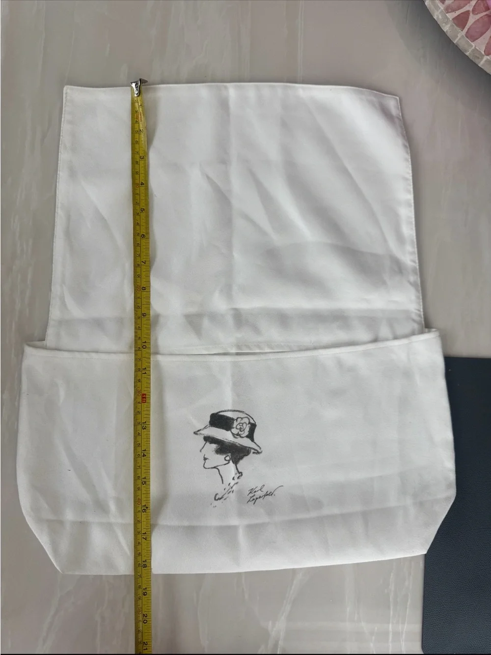 CHANEL White Dust Bag with Black Quilted Grid